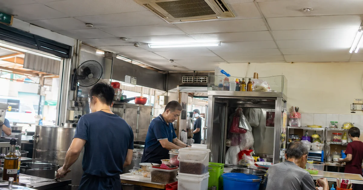Busy Singapore F&B outlet with ceiling cassette aircon visible
